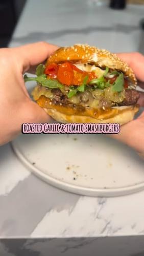 Roasted Garlic and Tomato Smash Burger with Arugula and Caramelized Onion